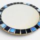 Round mosaic mirror in the style of Vallauris, France circa 1970.