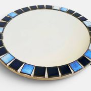 Round mosaic mirror in the style of Vallauris, France circa 1970.