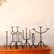 Pair of twisted tripod candlesticks in black iron, Brutalist, 1970 - 44 cm