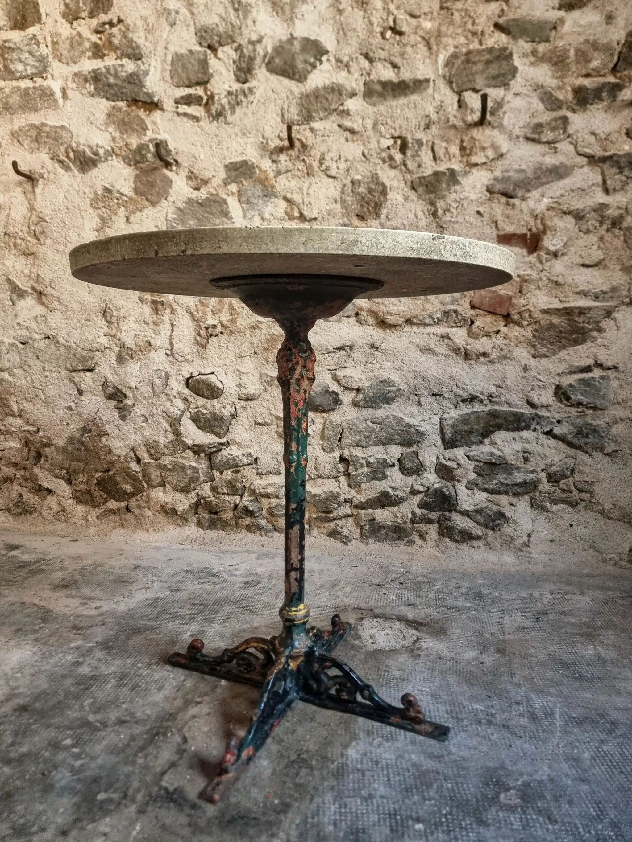 Bistro table / old garden with a cast iron base and stone top, France