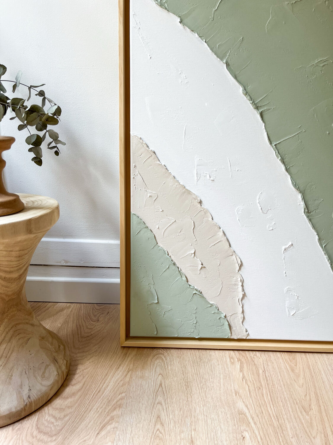 Beige, white, sage green relief table.