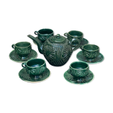 Service to the ceramic enamelled chiseled green and vintage