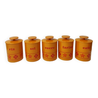 5 orange spice jars