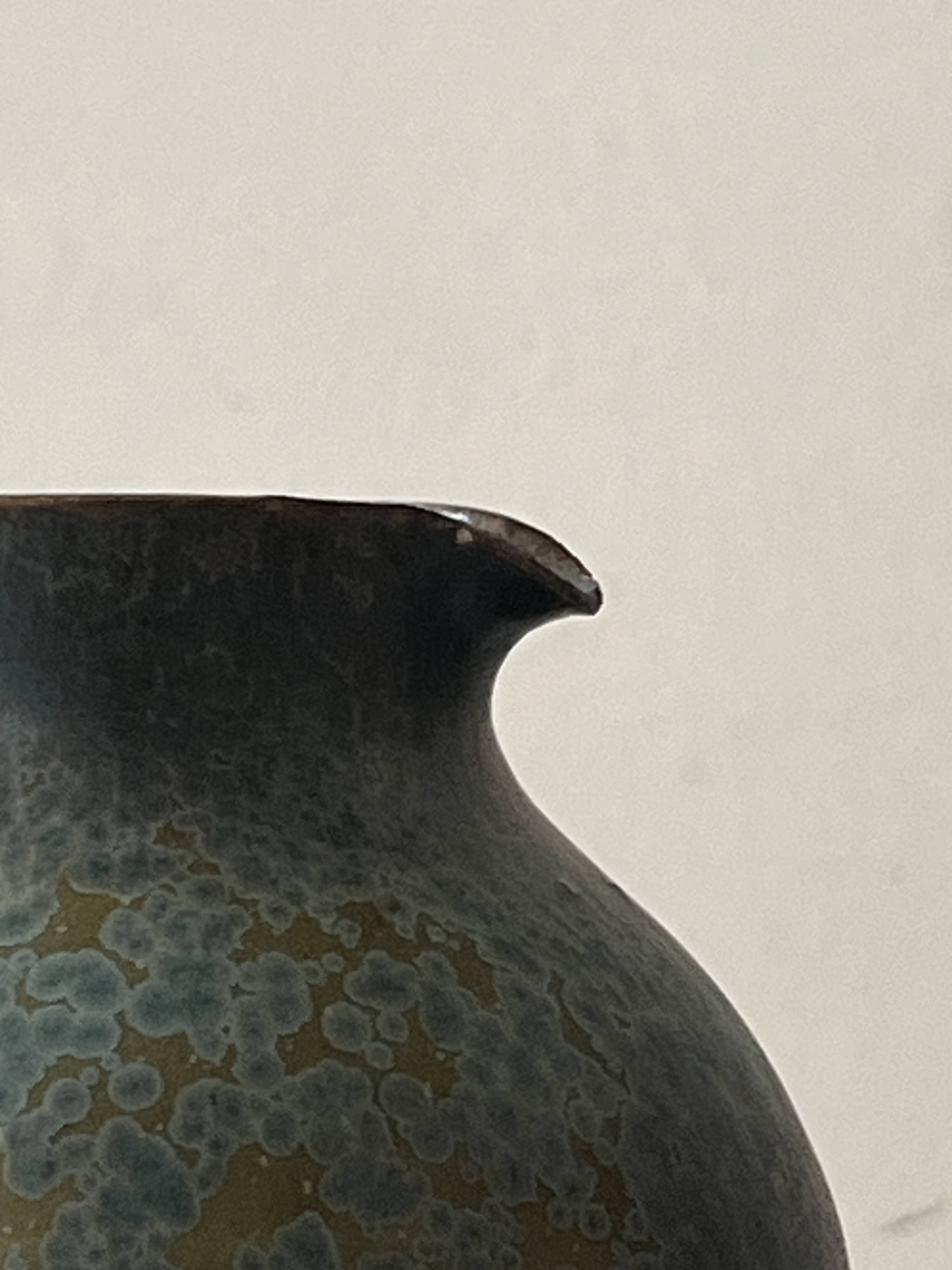 Brownish blue ceramic vase signed AH, France 1950.
