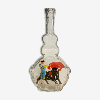 Glass bottle bullfight scene