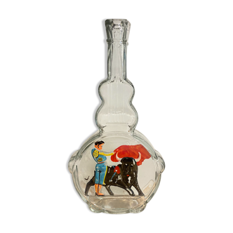 Glass bottle bullfight scene