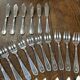 Set of 12 fish knives + 12 fish forks in silver-plated metal
