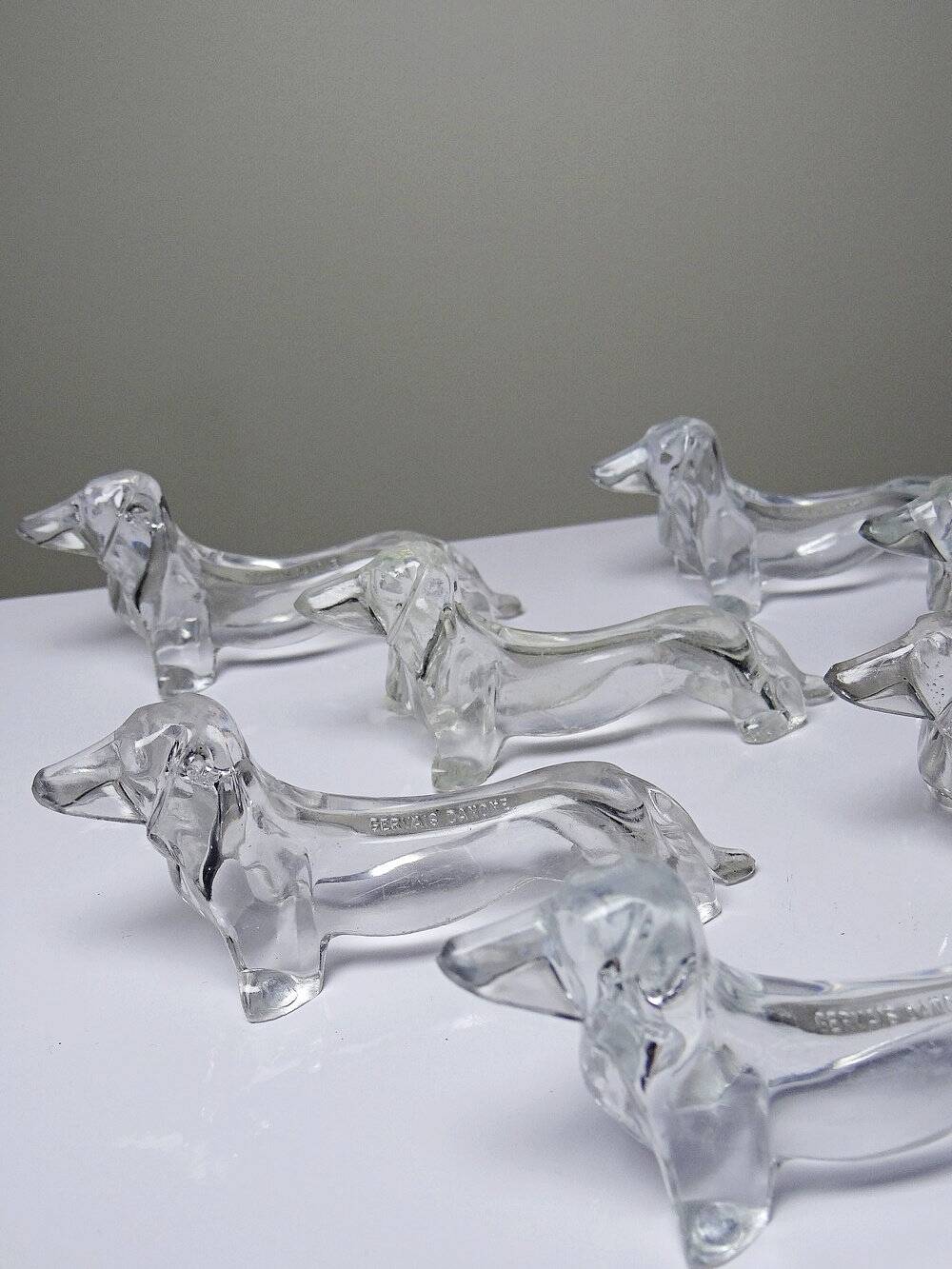 Vintage Gervais Danone knife holders, dachshund design, clear plastic