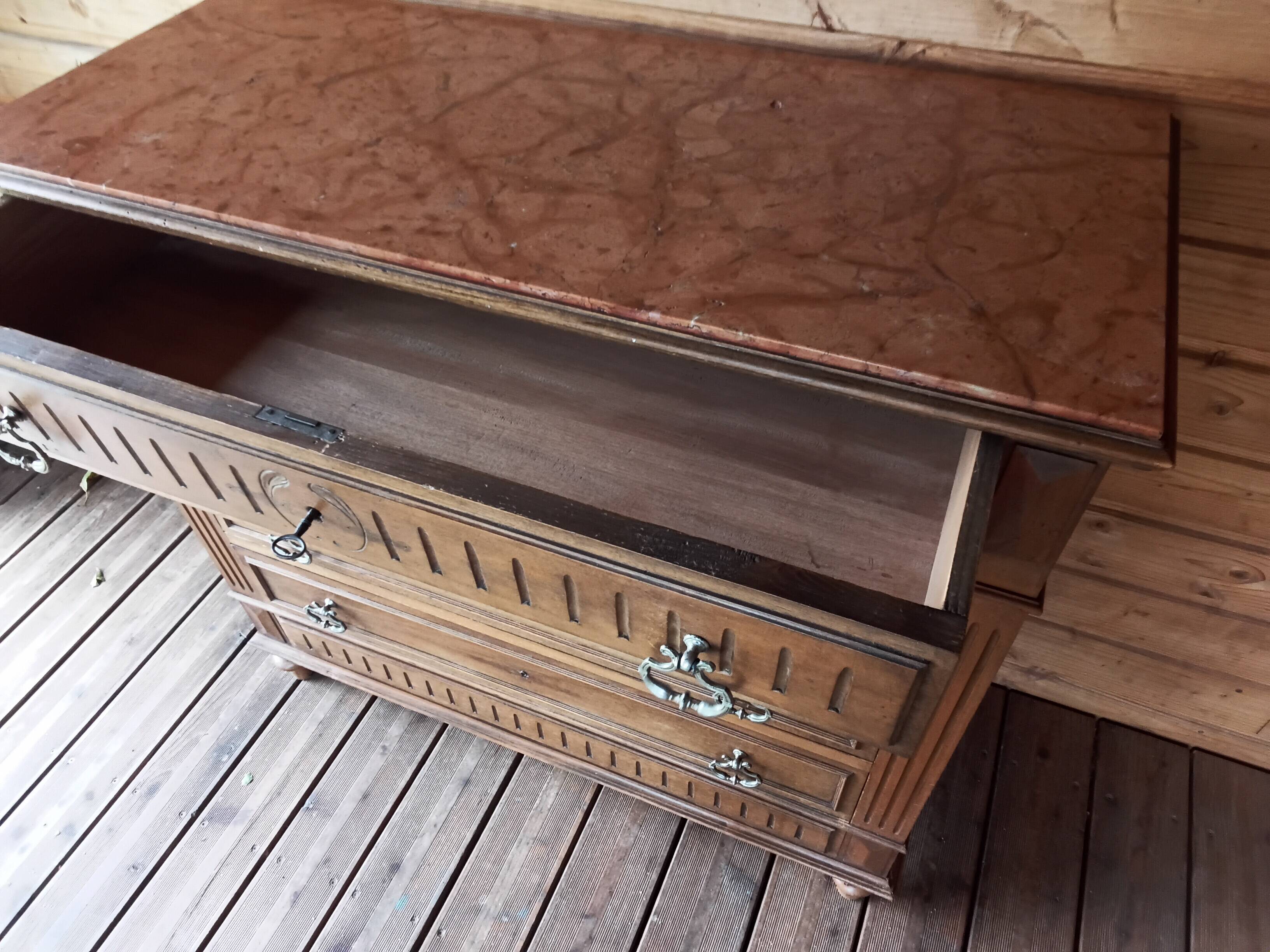 Antique chest of drawers with marble top