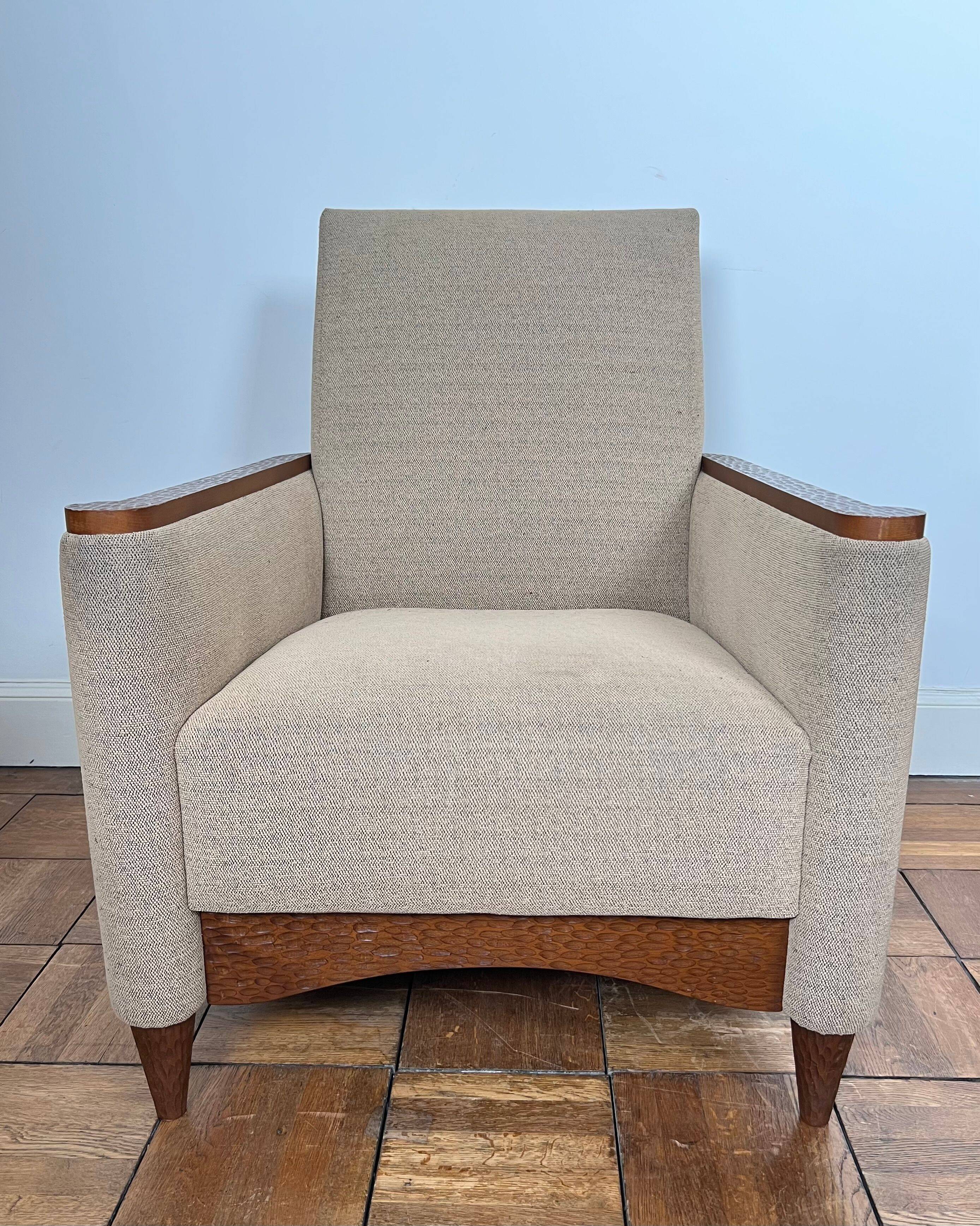 Pair of armchairs in carved wood and vintage fabric