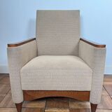 Pair of armchairs in carved wood and vintage fabric
