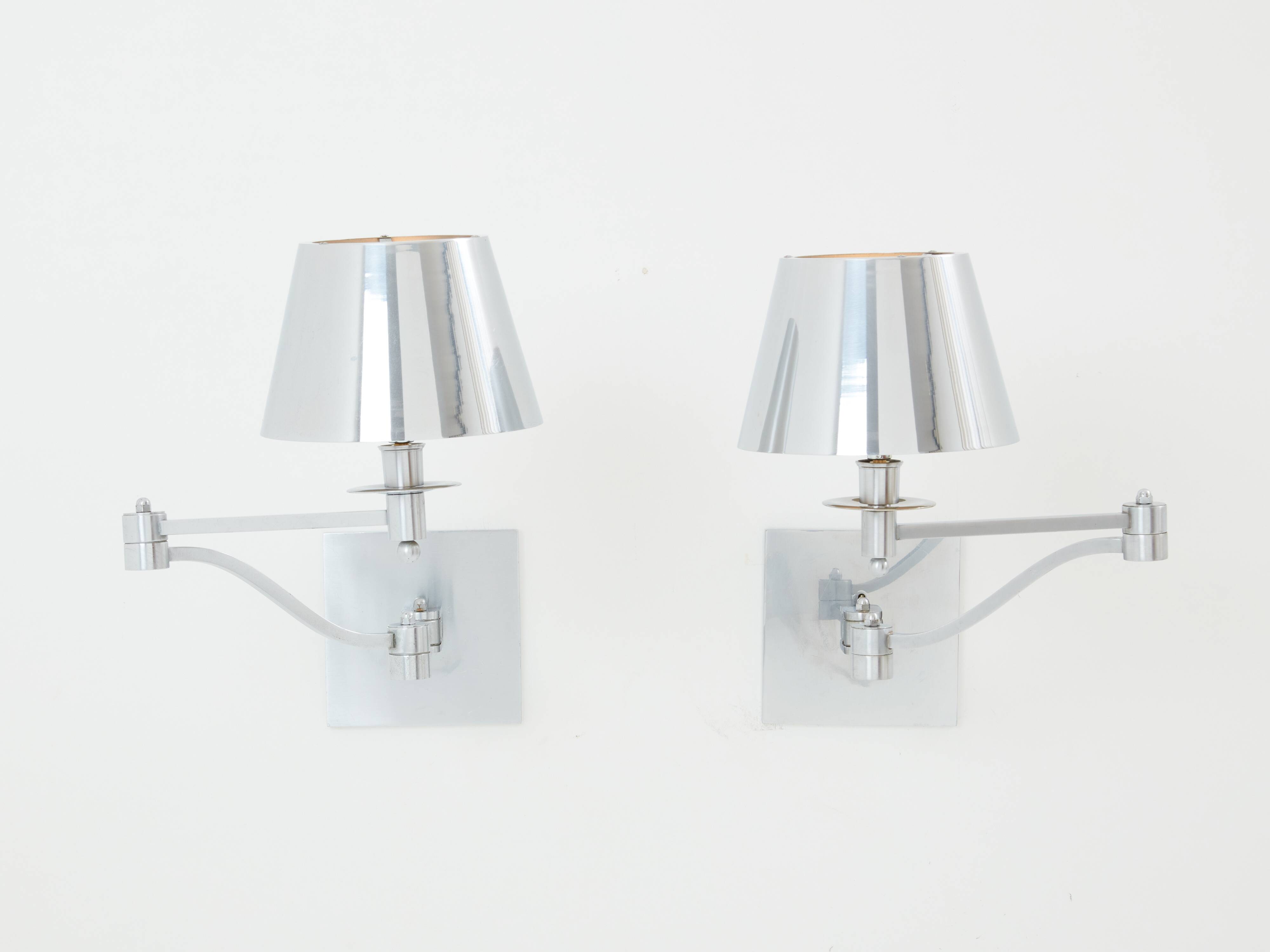 Pair of Maison Charles adjustable brushed steel wall lights circa 1960
