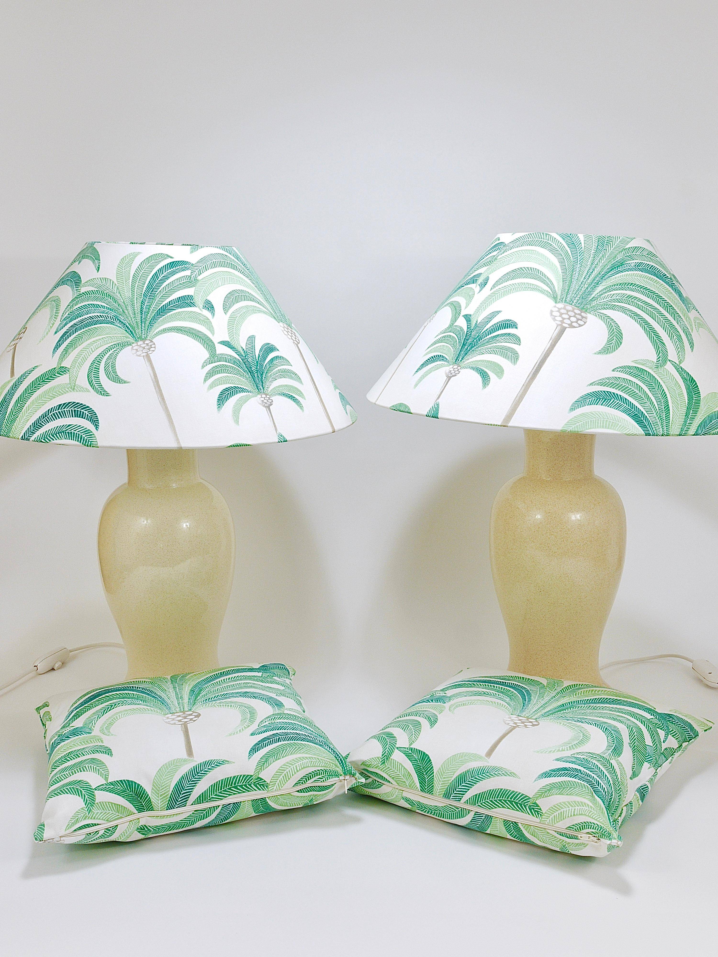 Pair of Tommaso Barbi Riviera palm tree table lamps from the 1970s with matching cushions.