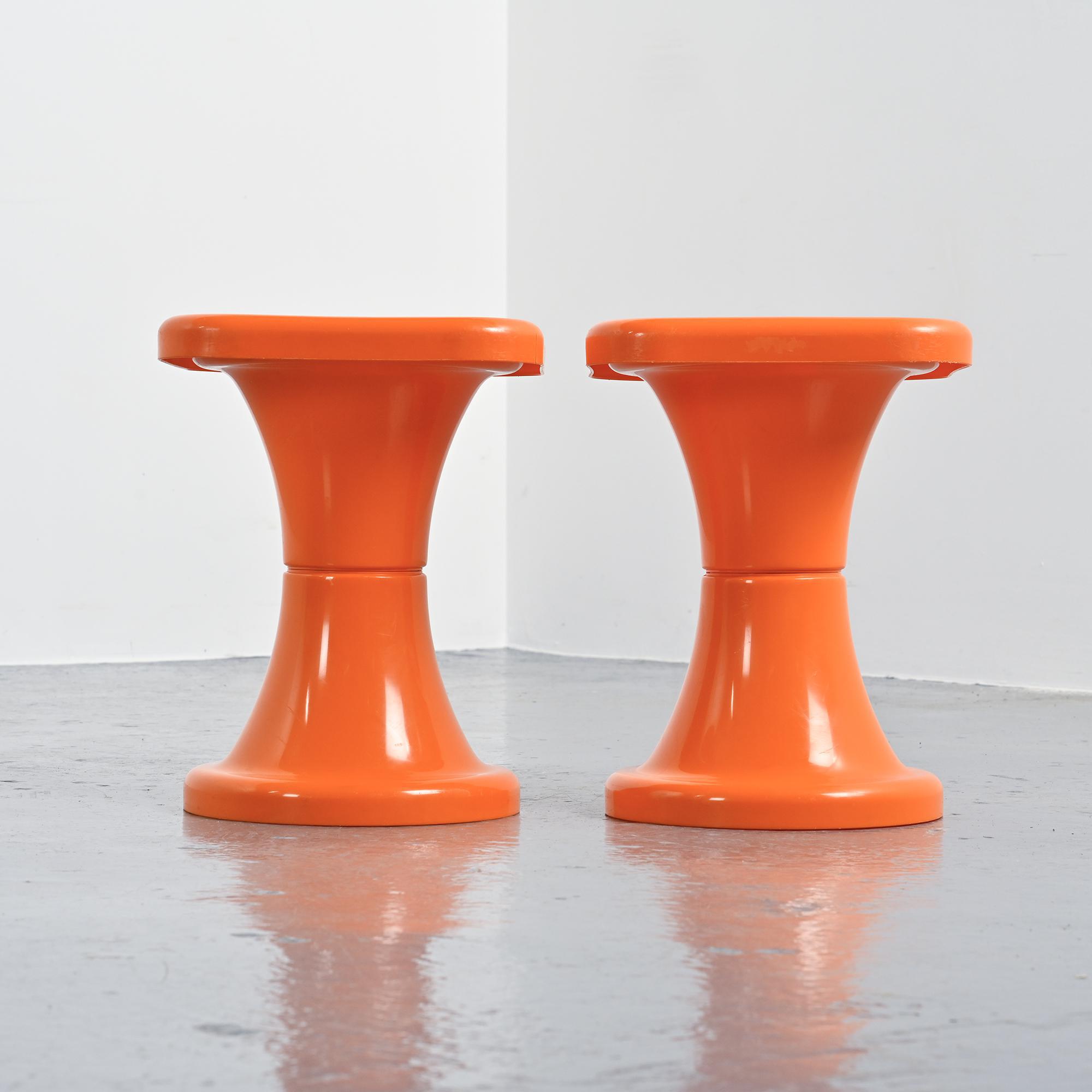Pair of orange Tam Tam stools by S.E.L.U.P.