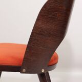 Scandinavian design orange papaya shell dining chairs
