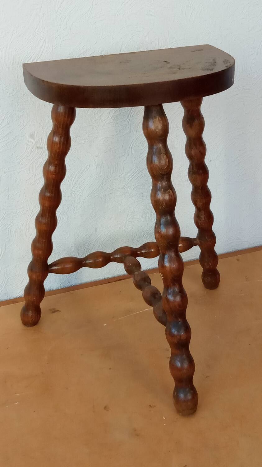 Beaded leg tripod stool