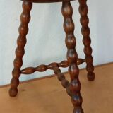 Beaded leg tripod stool