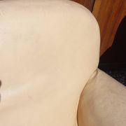 Pair of 1930s club armchairs in ivory leather.