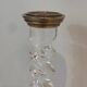 Pair of twisted plexiglass and silver-plated candlesticks