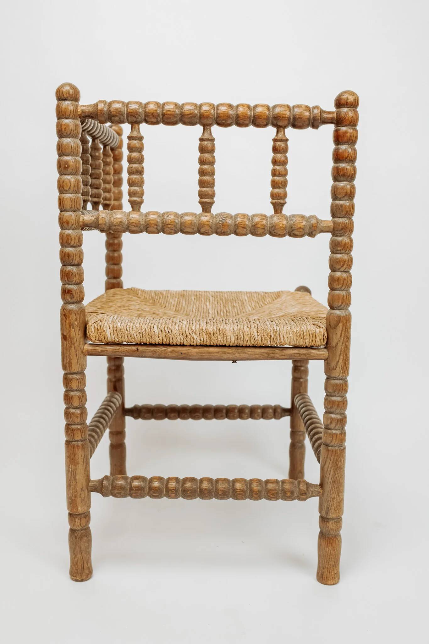 Classic vintage bobbin corner armchair