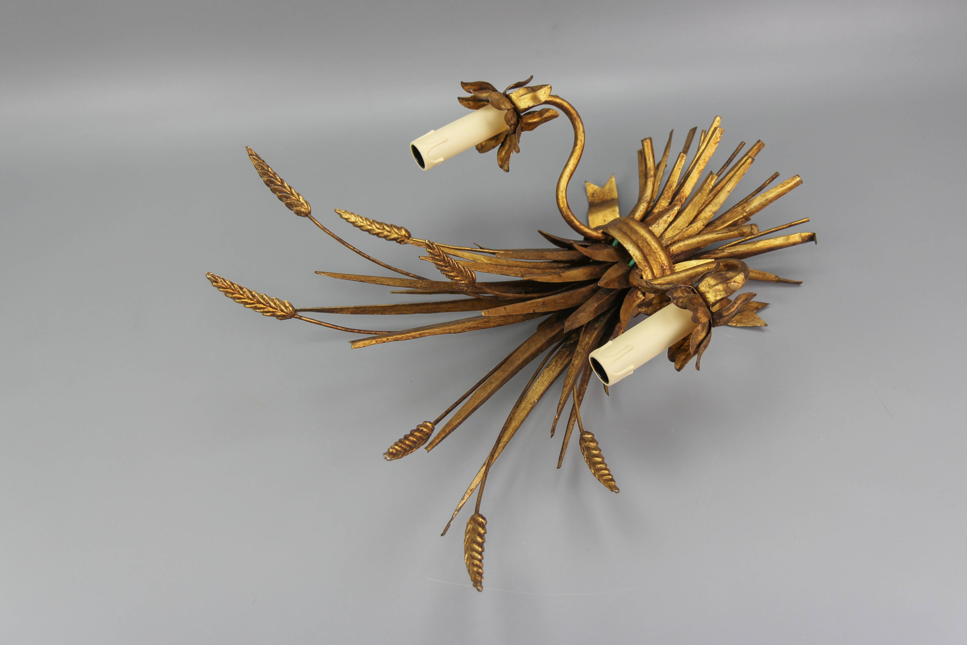 Gilt metal wheat sheaf two-light wall sconce