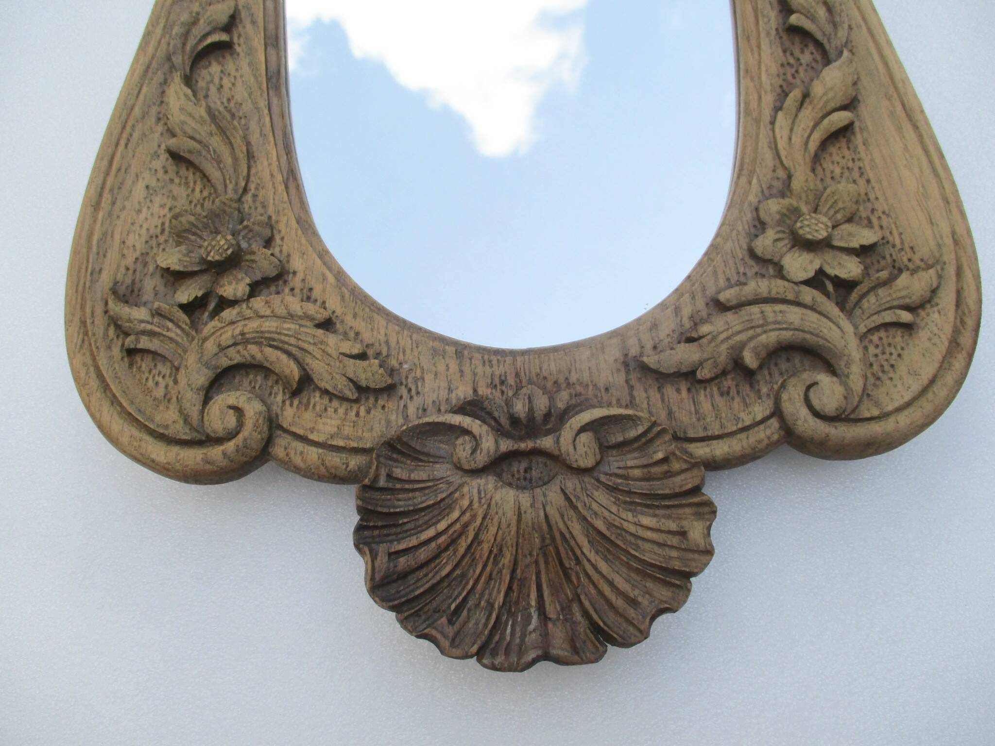 Antique carved wooden mirror