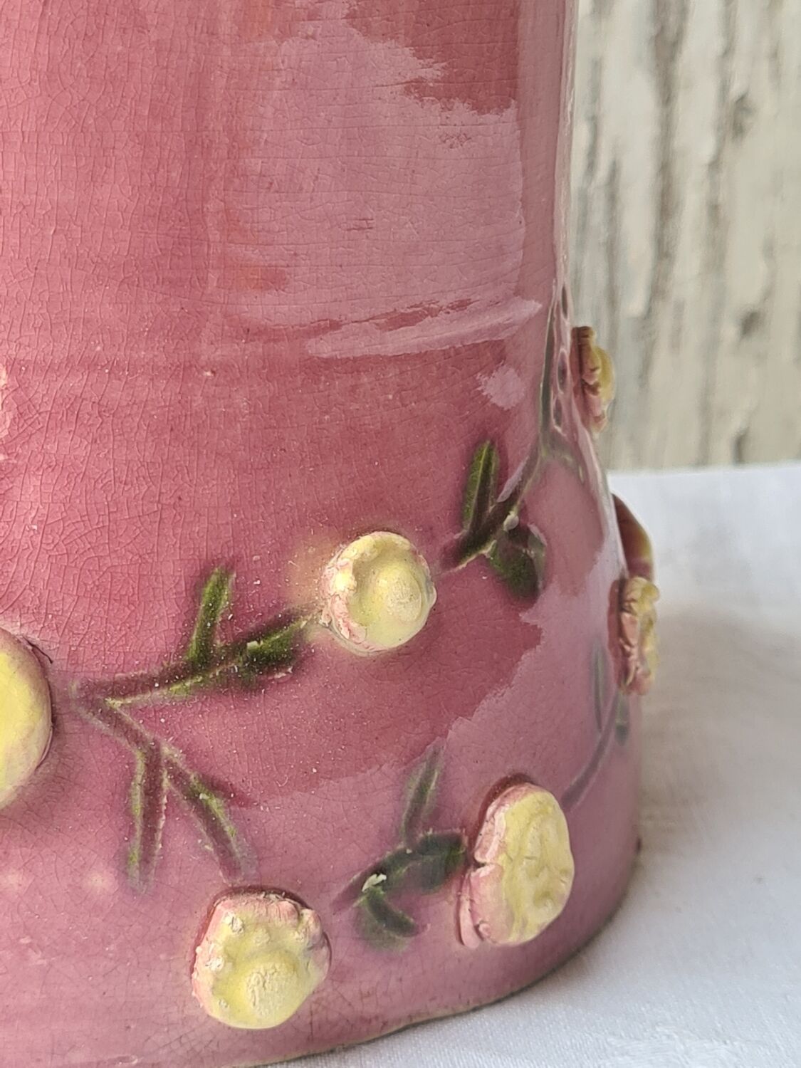 Glazed terracotta pitcher with mimosa decoration