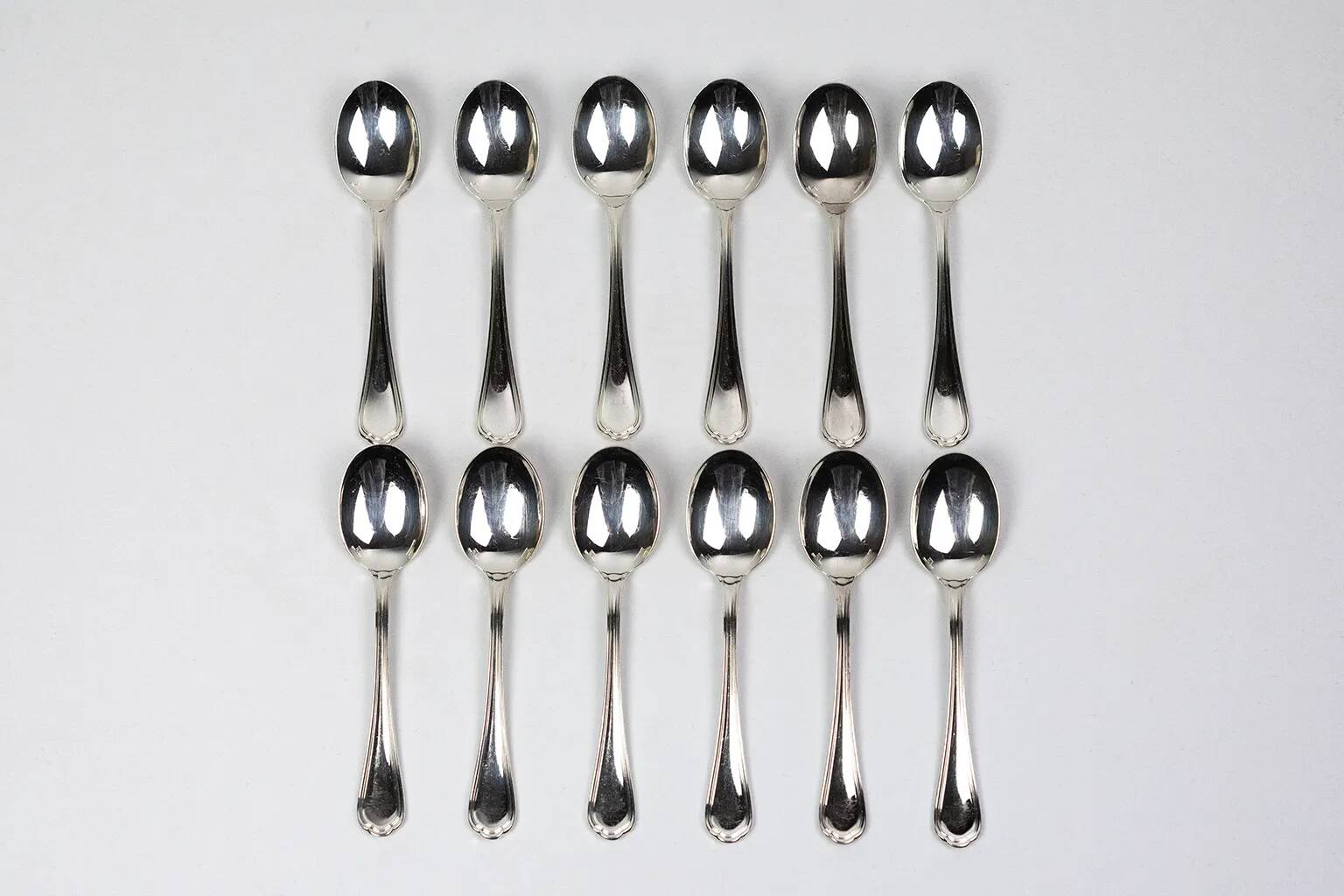 Christofle – 12 silver-plated coffee spoons Spatours in their case