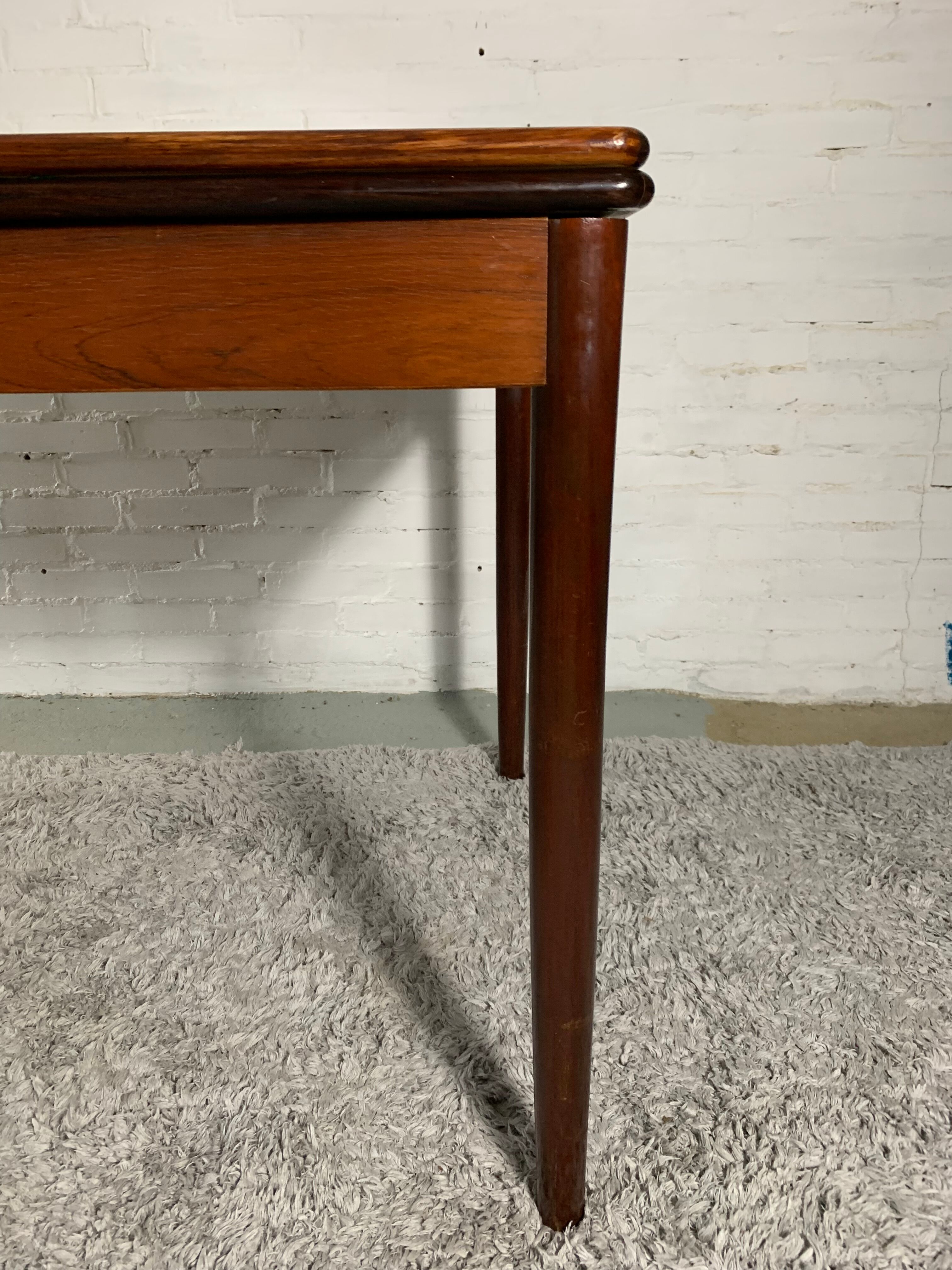 Danish rosewood dining table with extensions, 1960s
