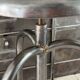 Height-adjustable tripod metal stool