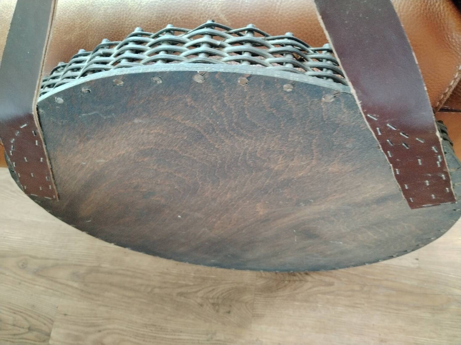 Old rattan mirror with leather strap