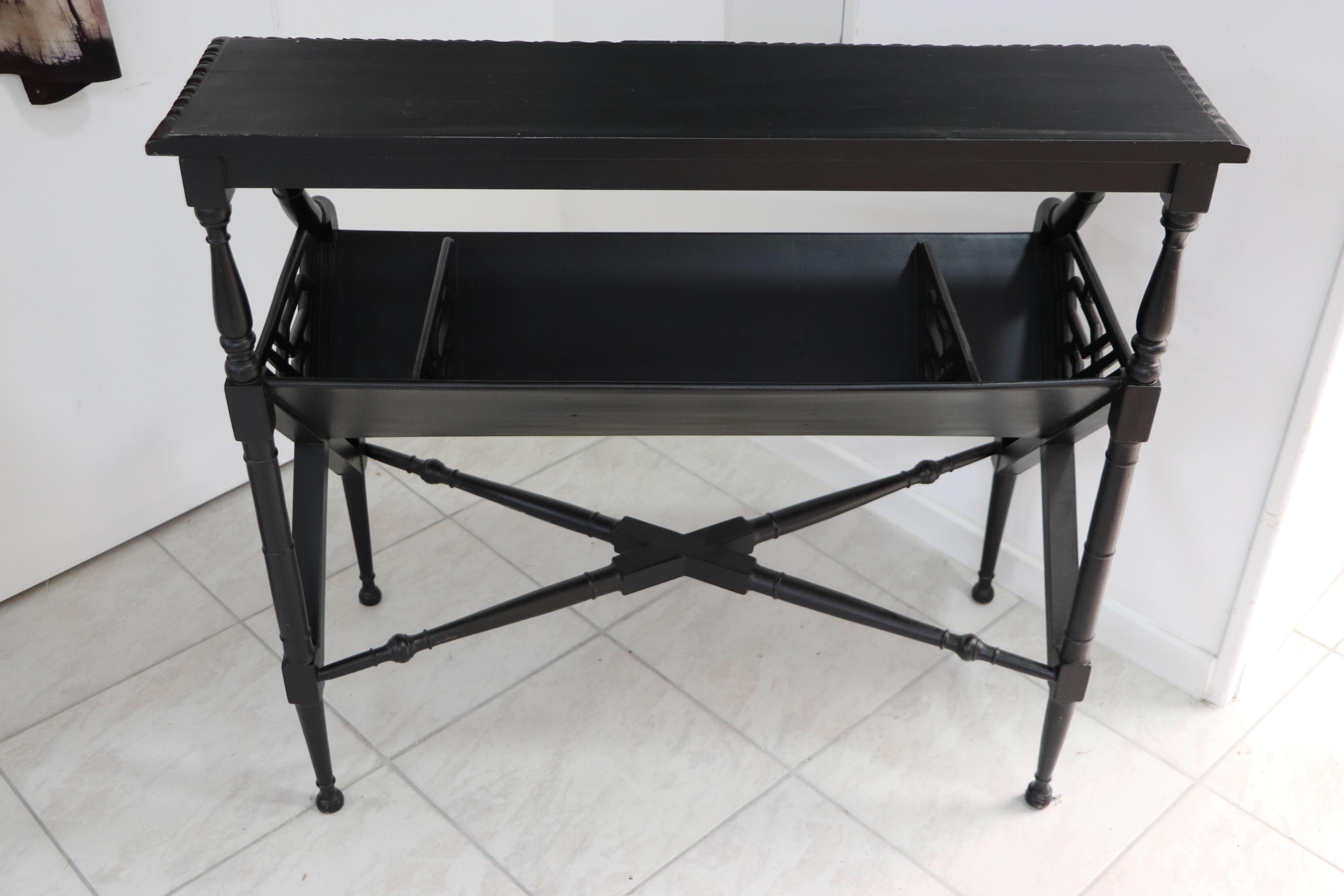 Black lacquered Indochinese console with disk storage