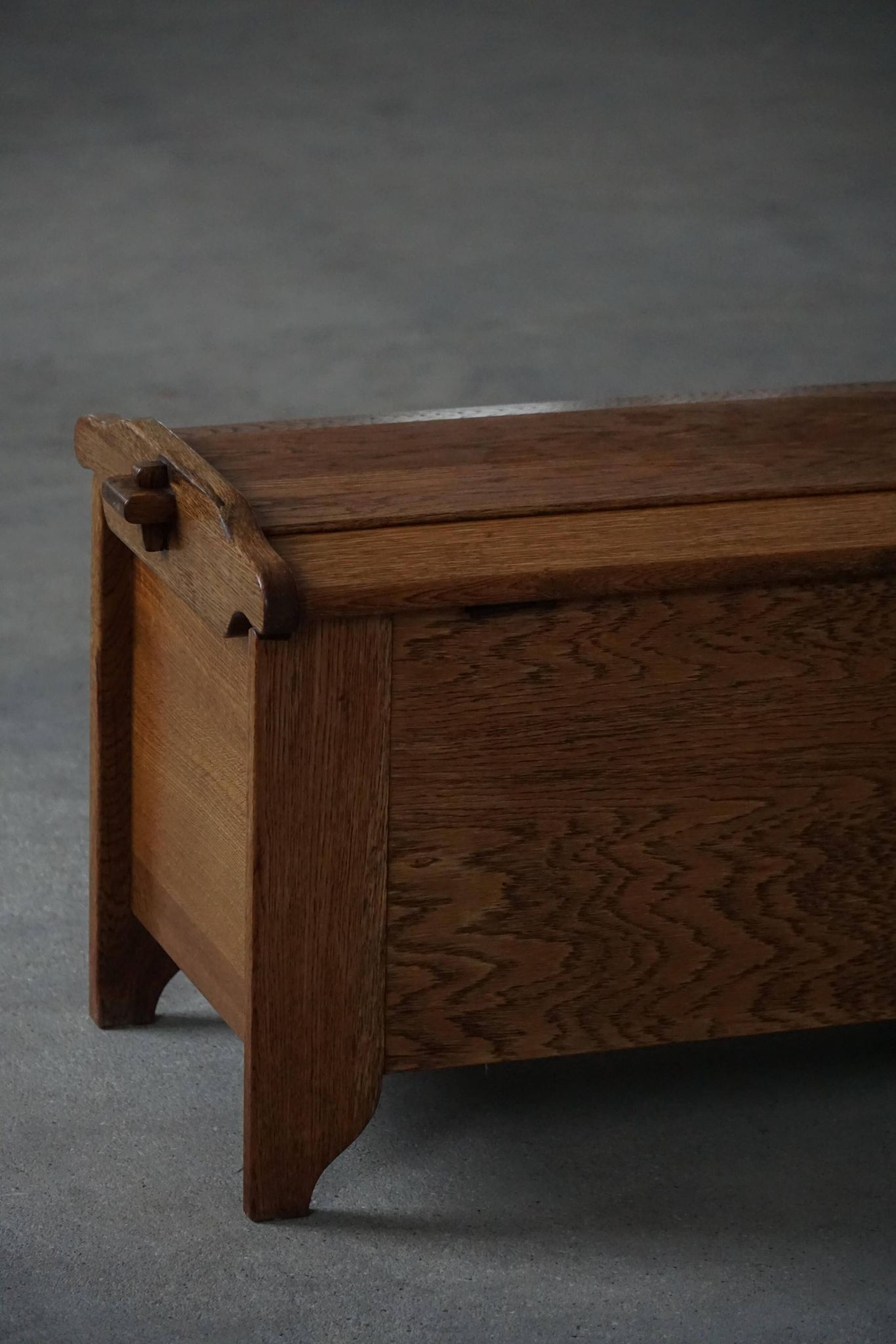 Modern Danish oak commode with decorative relief sculpture, mid-20th century.