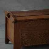 Modern Danish oak commode with decorative relief sculpture, mid-20th century.