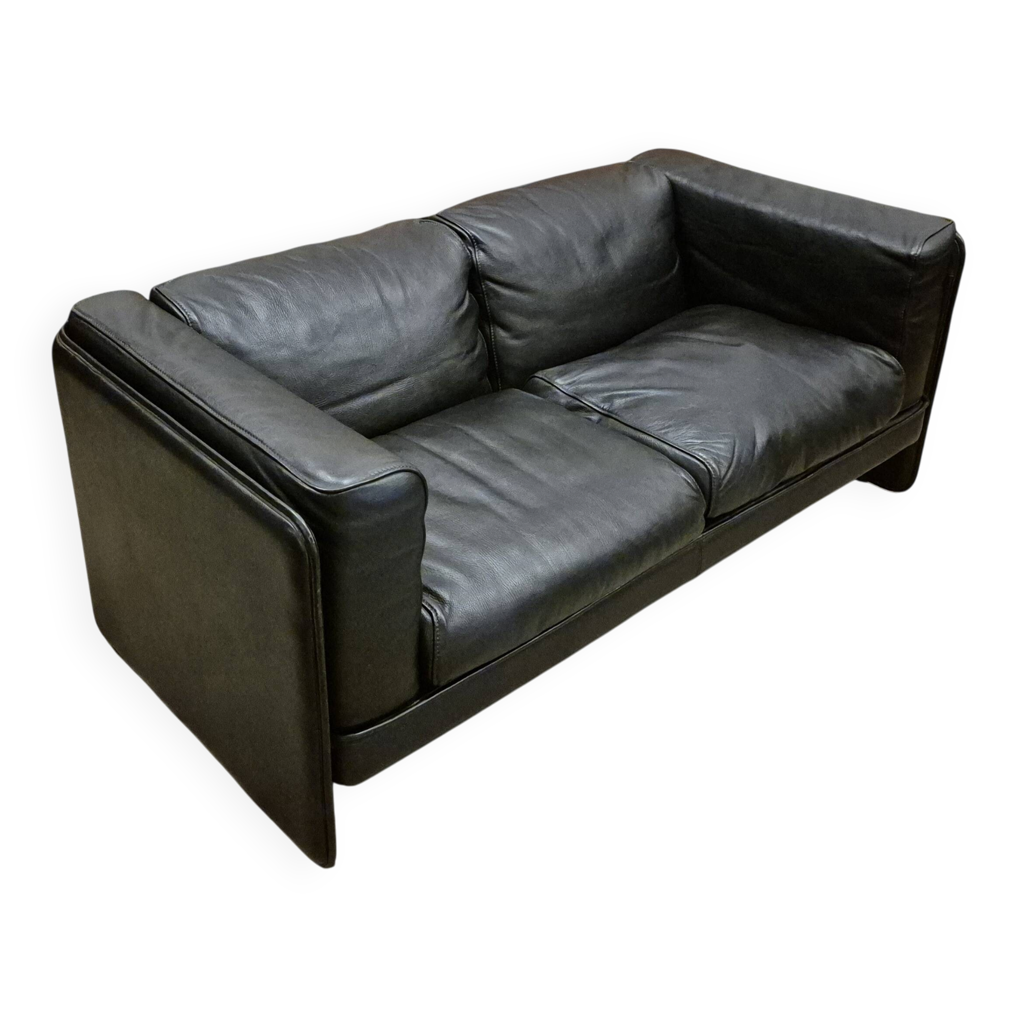 Two-seater sofa in black leather, designed by Tito Agnoli for Poltrona Frau, Italy, 1980s