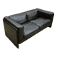 Two-seater sofa in black leather, designed by Tito Agnoli for Poltrona Frau, Italy, 1980s