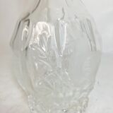 Bouteille en verre sculpté