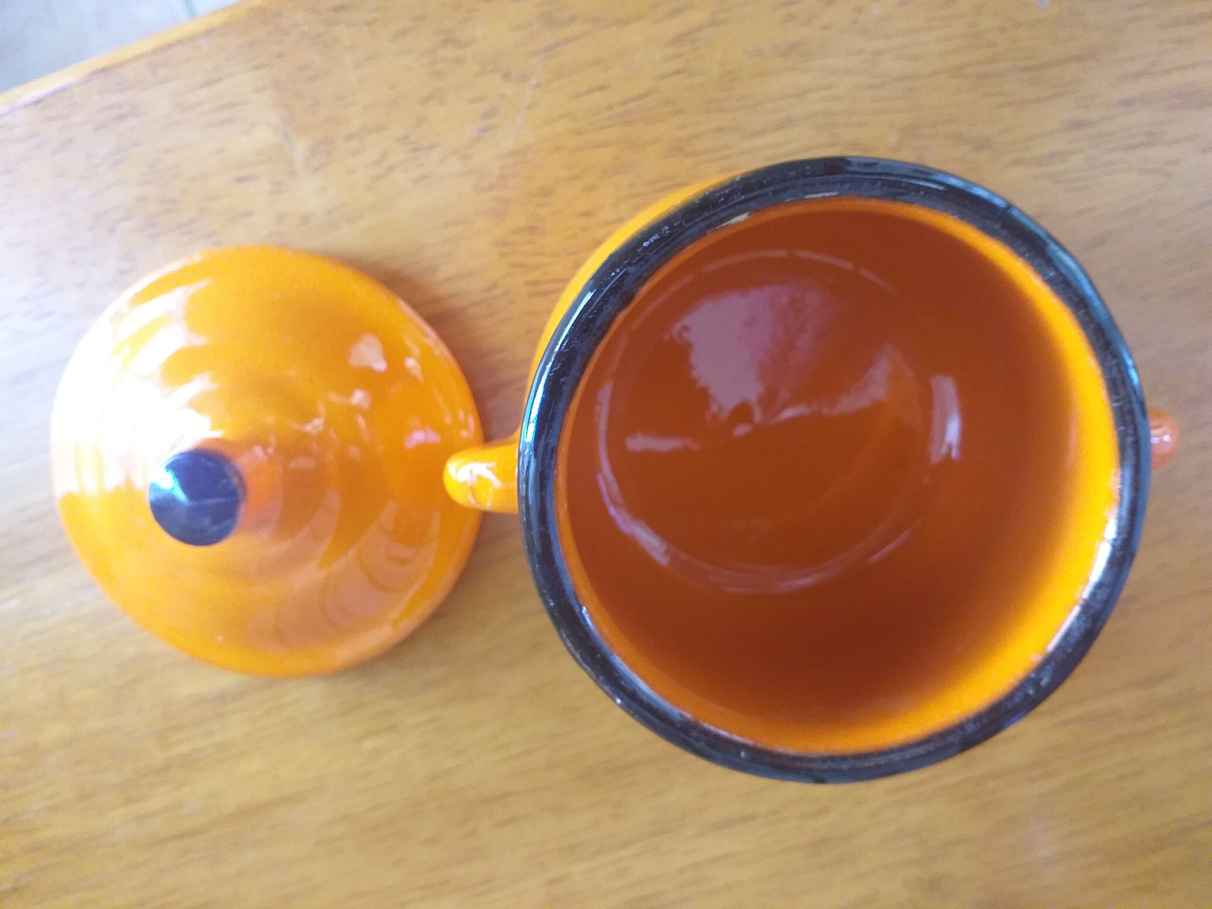 Sugar pot in orange enamelled sandstone