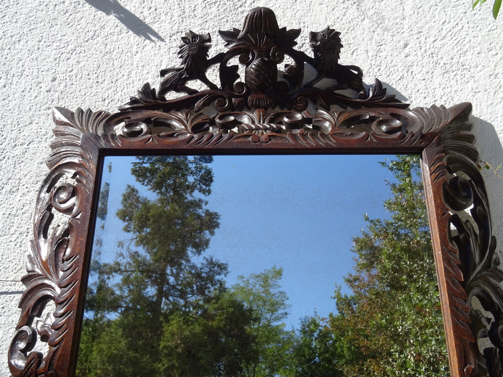 Miroir sculpté fronton lions