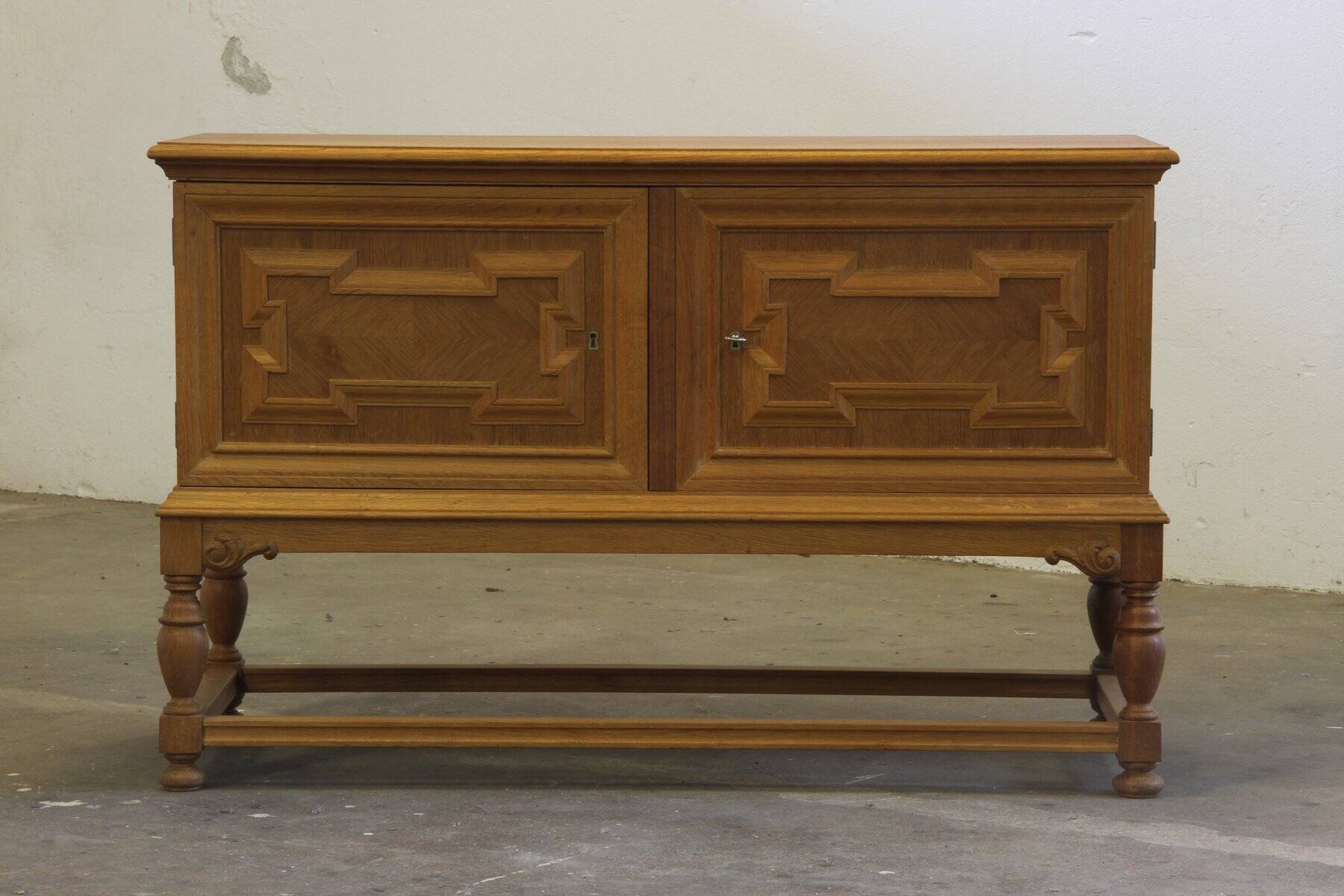 Vintage low sideboard in oak by Henning Kjærnulf, 1960s
