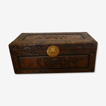 Carved wooden chest with Asian décor