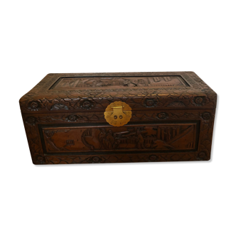Carved wooden chest with Asian décor
