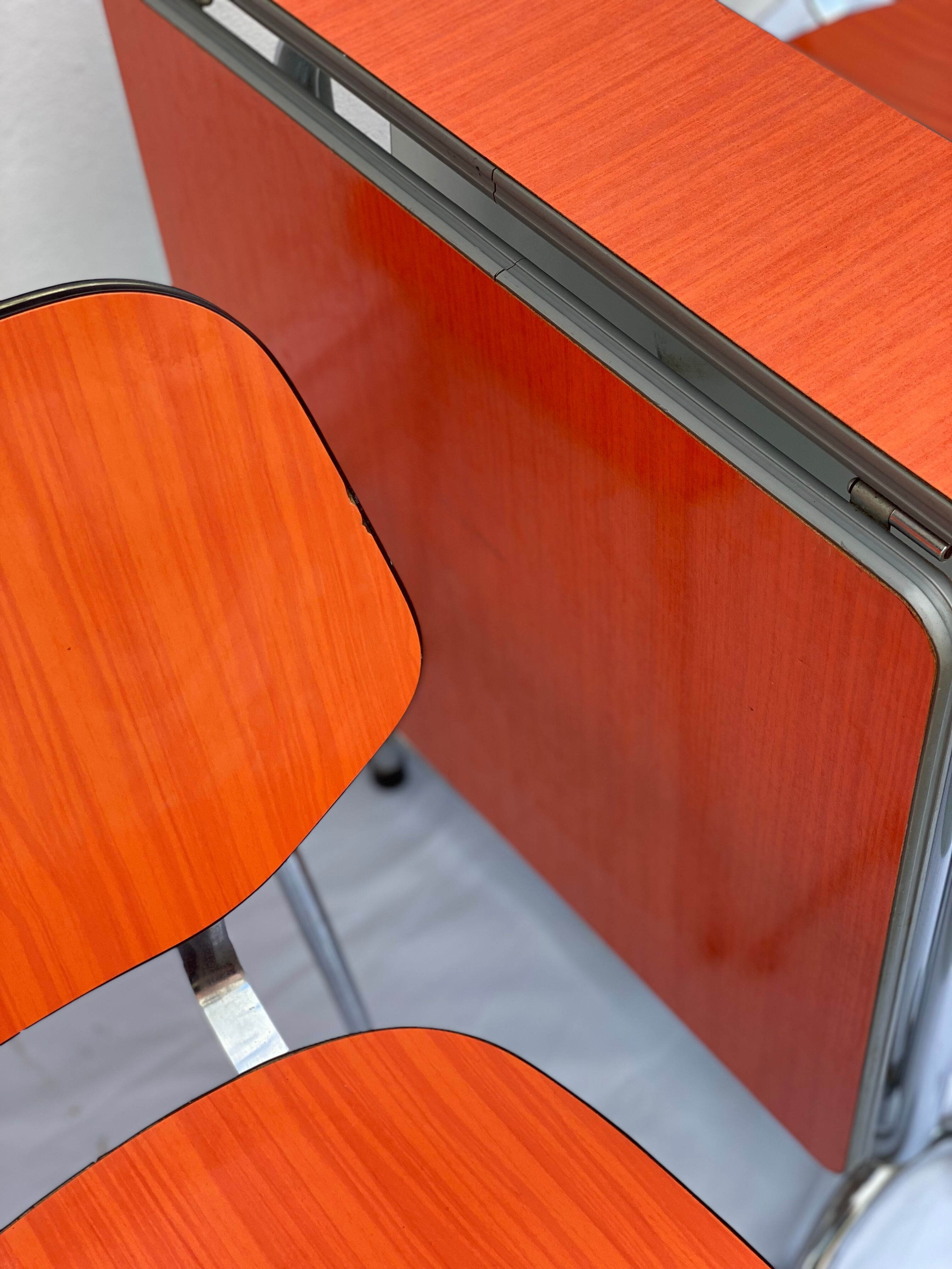 Orange formica table and 4 chairs