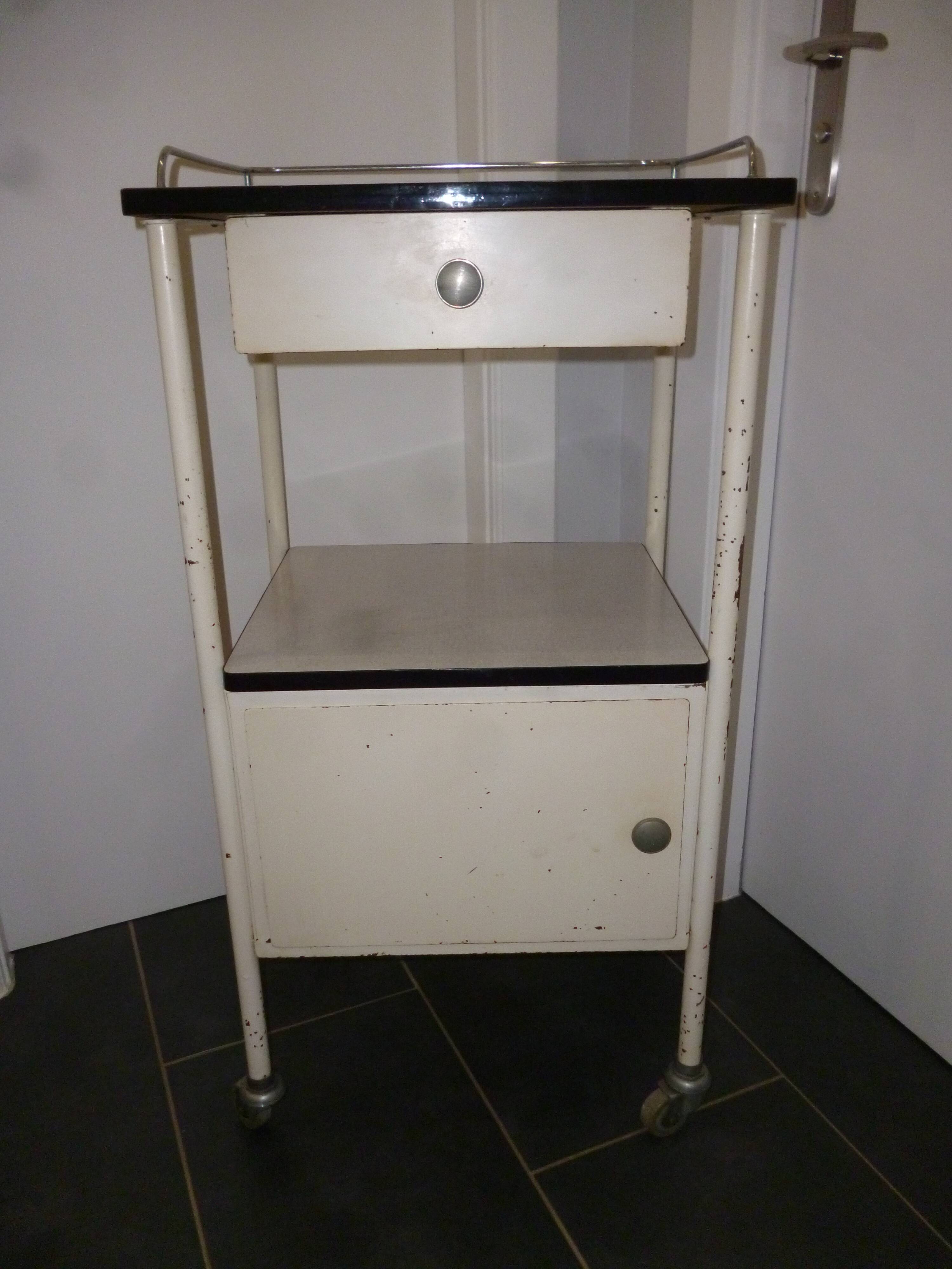 Old bedside on wheels