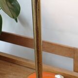 Vintage adjustable lamp, orange, made of metal.
