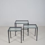 Tables gigognes en bois teinté noir et plateau en verre, années 1960