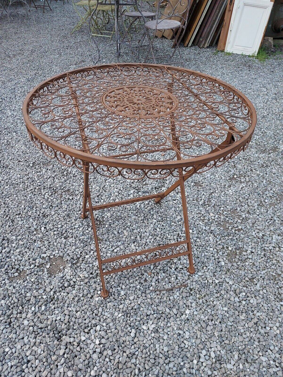 Garden furniture in brown patinated iron