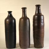 Lot de trois bouteilles anciennes en grès