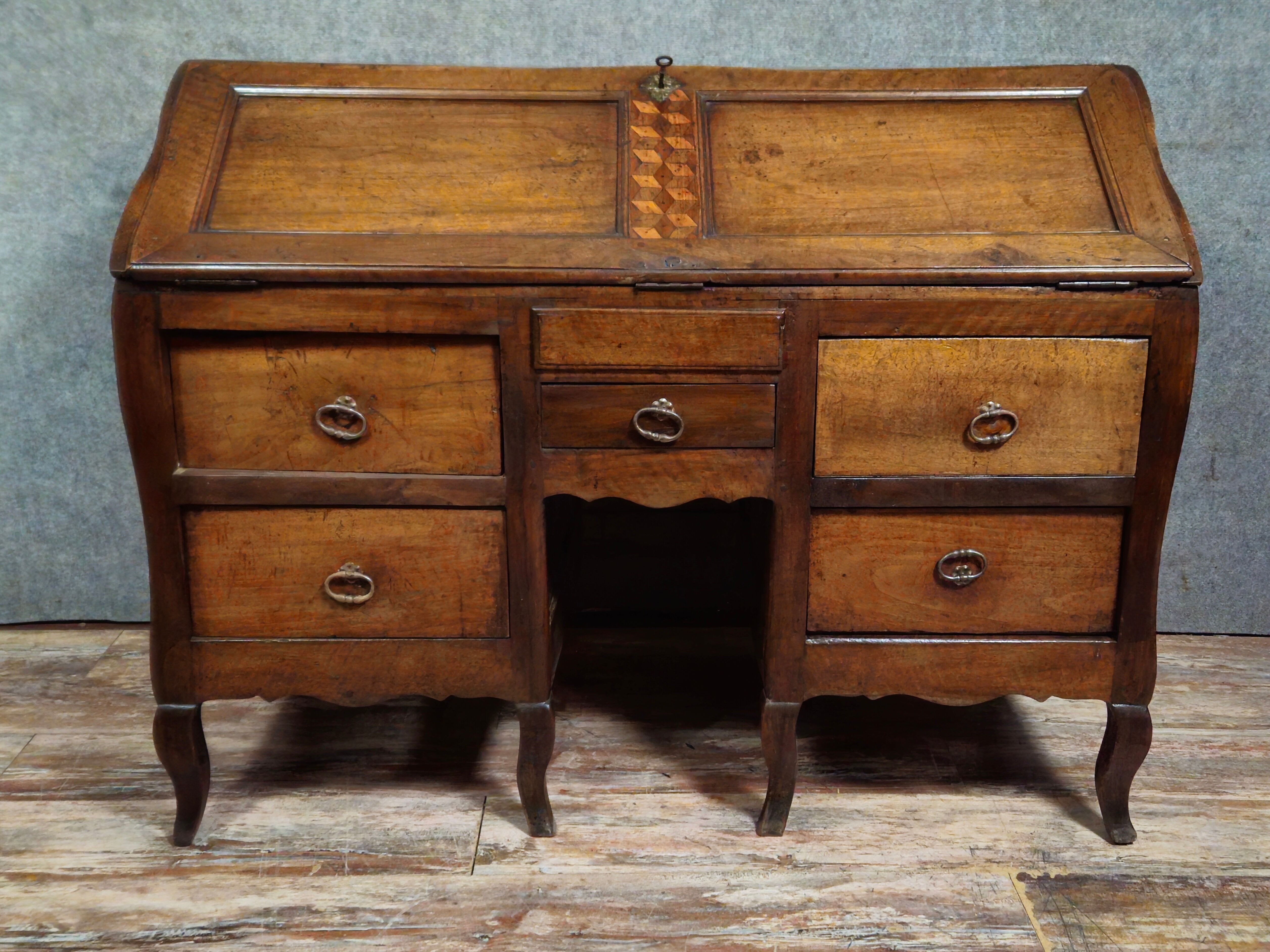 Antique curved secretary desk, Louis XV style, made of solid wood and marquetry.