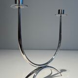 Silver-plated metal and plexiglass design candlestick.